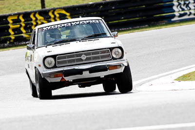 119;12-April-2009;1971-Datsun-1200-Coupe;Australia;Bathurst;FOSC;Festival-of-Sporting-Cars;Kurt-Woodward;Mt-Panorama;NSW;New-South-Wales;Regularity;auto;motorsport;racing;super-telephoto