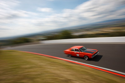 60;1970-Chrysler-Valiant-VG-Pacer;3-April-2010;Australia;Bathurst;Cameron-Tilley;FOSC;Festival-of-Sporting-Cars;Historic-Touring-Cars;Mt-Panorama;NSW;New-South-Wales;auto;classic;clouds;motion-blur;motorsport;movement;racing;sky;speed;vintage;wide-angle