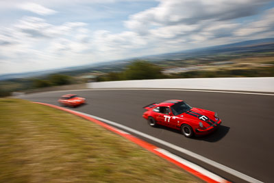 77;1974-Porsche-911-Carrera;3-April-2010;Australia;Bathurst;Bryan-Taylor;FOSC;Festival-of-Sporting-Cars;Historic-Sports-Cars;Mt-Panorama;NSW;New-South-Wales;auto;classic;clouds;motion-blur;motorsport;racing;sky;vintage;wide-angle