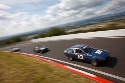 31;1975-Alfa-Romeo-Alfetta-GT;3-April-2010;Australia;Bathurst;FOSC;Festival-of-Sporting-Cars;Historic-Sports-Cars;Mt-Panorama;NSW;New-South-Wales;Paul-Newby;auto;classic;clouds;motion-blur;motorsport;racing;sky;vintage;wide-angle