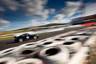 162;4-April-2010;Australia;Bathurst;FOSC;Festival-of-Sporting-Cars;Mt-Panorama;NSW;New-South-Wales;Porsche-996-GT3;Regularity;auto;clouds;motion-blur;motorsport;racing;sky;wide-angle