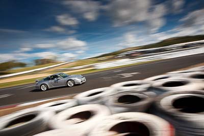 997;2005-Porsche-997-Carrera-S;4-April-2010;Australia;Bathurst;Chris-Lau;FOSC;Festival-of-Sporting-Cars;LAU997;Mt-Panorama;NSW;New-South-Wales;Regularity;auto;clouds;motion-blur;motorsport;racing;sky;wide-angle