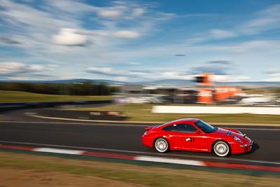 31;2005-Porsche-997-Carrera-S;4-April-2010;Australia;Bathurst;FOSC;Festival-of-Sporting-Cars;Mt-Panorama;NSW;New-South-Wales;Regularity;Stephen-Baulch;auto;clouds;motion-blur;motorsport;racing;sky;wide-angle