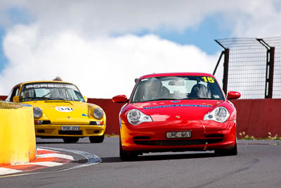 15;2002-Porsche-996;5-April-2010;Australia;Bathurst;FOSC;Festival-of-Sporting-Cars;Ian-Jenkins;Mt-Panorama;NSW;New-South-Wales;Regularity;UME661;auto;motorsport;racing;super-telephoto