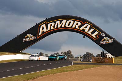 14;35;14;22-April-2011;35;Australia;Bathurst;Bathurst-Motor-Festival;Chris-Berry;Ford-Falcon-AU;Holden-Commodore-VT;Mt-Panorama;NSW;New-South-Wales;Saloon-Cars;Simon-Tabinor;auto;clouds;motorsport;racing;sky