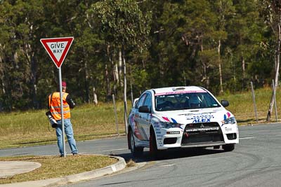 18;13-May-2011;APRC;Akiko-Nakagawa;Asia-Pacific-Rally-Championship;Atsushi-Masumura;Australia;Caloundra;IROQ;International-Rally-Of-Queensland;Mitsubishi-Lancer-Evolution-X;QLD;Queensland;Sunshine-Coast;Super-Alex-Troop;auto;motorsport;racing;shakedown;telephoto