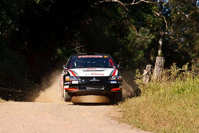 21;14-May-2011;21;ARC;Australia;Australian-Rally-Championship;IROQ;Imbil;International-Rally-Of-Queensland;Lee-Tierney;Mark-Pedder;Mitsubishi-Lancer-Evolution-IX;Pedders-Suspension;QLD;Queensland;Sunshine-Coast;auto;motorsport;racing;super-telephoto