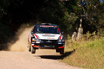 21;14-May-2011;21;ARC;Australia;Australian-Rally-Championship;IROQ;Imbil;International-Rally-Of-Queensland;Lee-Tierney;Mark-Pedder;Mitsubishi-Lancer-Evolution-IX;Pedders-Suspension;QLD;Queensland;Sunshine-Coast;auto;motorsport;racing;super-telephoto