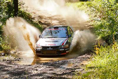 21;14-May-2011;21;ARC;Australia;Australian-Rally-Championship;IROQ;Imbil;International-Rally-Of-Queensland;Lee-Tierney;Mark-Pedder;Mitsubishi-Lancer-Evolution-IX;Pedders-Suspension;QLD;Queensland;Sunshine-Coast;auto;motorsport;racing;telephoto