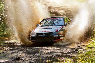 21;14-May-2011;21;ARC;Australia;Australian-Rally-Championship;IROQ;Imbil;International-Rally-Of-Queensland;Lee-Tierney;Mark-Pedder;Mitsubishi-Lancer-Evolution-IX;Pedders-Suspension;QLD;Queensland;Sunshine-Coast;auto;motorsport;racing;telephoto