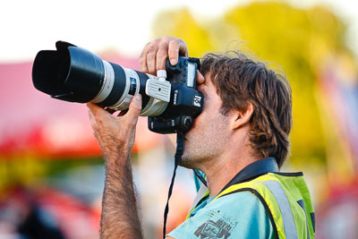 14-May-2011;Australia;IROQ;Imbil;International-Rally-Of-Queensland;Nigel-Raynard;QLD;Queensland;Sunshine-Coast;auto;camera;motorsport;photographer;portrait;racing;service-park;telephoto