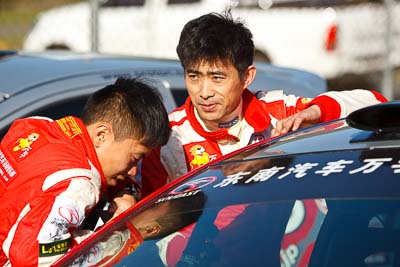 15-May-2011;APRC;Asia-Pacific-Rally-Championship;Australia;Hongyu-Pan;IROQ;Imbil;International-Rally-Of-Queensland;Junwei-Fang;QLD;Queensland;Sunshine-Coast;auto;motorsport;portrait;racing;service-park;telephoto