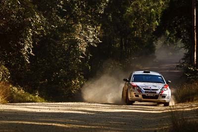 15;15-May-2011;APRC;Asia-Pacific-Rally-Championship;Australia;IROQ;Imbil;International-Rally-Of-Queensland;Karamjit-Singh;Proton-Cusco-Rally-Team;Proton-Satria-Neo;QLD;Queensland;Sunshine-Coast;Vivek-Ponnusamy;auto;motorsport;racing;special-stage;telephoto