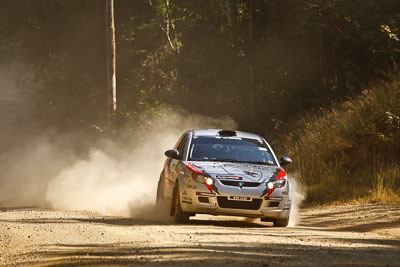 16;15-May-2011;16;APRC;Akira-Bamba;Asia-Pacific-Rally-Championship;Australia;IROQ;Imbil;International-Rally-Of-Queensland;Proton-Cusco-Rally-Team;Proton-Satria-Neo;QLD;Queensland;Sunshine-Coast;Takahiro-Yasui;auto;motorsport;racing;special-stage;telephoto