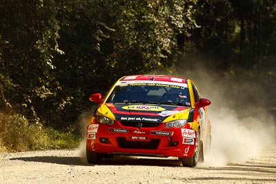 17;15-May-2011;17;APRC;Asia-Pacific-Rally-Championship;Australia;Gunaseelan-Rajoo;IROQ;Imbil;International-Rally-Of-Queensland;Jagdev-Singh;Pennzoil-GSR-Racing-Team;Proton-Satria-Neo;QLD;Queensland;Sunshine-Coast;auto;motorsport;racing;special-stage;telephoto