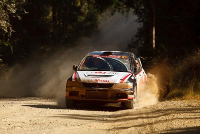 21;15-May-2011;21;ARC;Australia;Australian-Rally-Championship;IROQ;Imbil;International-Rally-Of-Queensland;Lee-Tierney;Mark-Pedder;Mitsubishi-Lancer-Evolution-IX;Pedders-Suspension;QLD;Queensland;Sunshine-Coast;auto;motorsport;racing;special-stage;telephoto