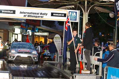 15-July-2011;APRC;Asia-Pacific-Rally-Championship;International-Rally-Of-Whangarei;NZ;New-Zealand;Northland;Rally;Whangarei;auto;ceremonial-start;ceremony;child;flag;garage;kid;motorsport;night;pre‒event;racing;start;telephoto