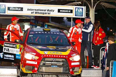 19;15-July-2011;19;APRC;Asia-Pacific-Rally-Championship;Fan-Fan;International-Rally-Of-Whangarei;Junwei-Fang;Mitsubishi-Lancer-Evolution-X;NZ;New-Zealand;Northland;Rally;Soueast-Motor-Kumho-Team;Whangarei;auto;ceremonial-start;ceremony;garage;motorsport;pre‒event;racing;start;telephoto