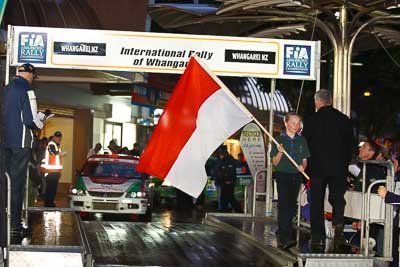 15-July-2011;APRC;Asia-Pacific-Rally-Championship;International-Rally-Of-Whangarei;NZ;New-Zealand;Northland;Rally;Whangarei;auto;ceremonial-start;ceremony;child;flag;garage;kid;motorsport;night;pre‒event;racing;start;telephoto