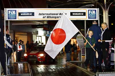 15-July-2011;APRC;Asia-Pacific-Rally-Championship;International-Rally-Of-Whangarei;NZ;New-Zealand;Northland;Rally;Whangarei;auto;ceremonial-start;ceremony;child;flag;garage;kid;motorsport;night;pre‒event;racing;start;telephoto