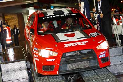 1;1;15-July-2011;APRC;Asia-Pacific-Rally-Championship;International-Rally-Of-Whangarei;Katsu-Taguchi;Mark-Stacey;Mitsubishi-Lancer-Evolution-X;NZ;New-Zealand;Northland;Rally;Team-MRF;Whangarei;auto;ceremonial-start;ceremony;garage;motorsport;pre‒event;racing;start;telephoto