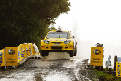 2;16-July-2011;2;APRC;Asia-Pacific-Rally-Championship;Chris-Atkinson;International-Rally-Of-Whangarei;NZ;New-Zealand;Northland;Proton-Motorsports;Proton-Satria-Neo-S2000;Rally;Stephane-Prevot;Whangarei;auto;garage;motorsport;racing;special-stage;super-telephoto