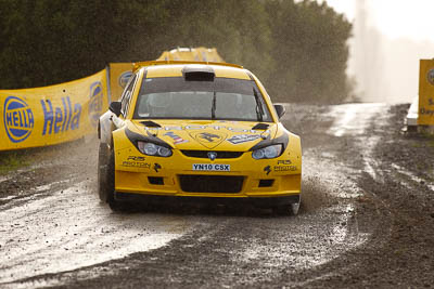 2;16-July-2011;2;APRC;Asia-Pacific-Rally-Championship;Chris-Atkinson;International-Rally-Of-Whangarei;NZ;New-Zealand;Northland;Proton-Motorsports;Proton-Satria-Neo-S2000;Rally;Stephane-Prevot;Whangarei;auto;garage;motorsport;racing;special-stage;super-telephoto