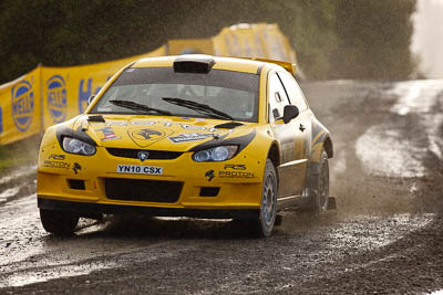 2;16-July-2011;2;APRC;Asia-Pacific-Rally-Championship;Chris-Atkinson;International-Rally-Of-Whangarei;NZ;New-Zealand;Northland;Proton-Motorsports;Proton-Satria-Neo-S2000;Rally;Stephane-Prevot;Whangarei;auto;garage;motorsport;racing;special-stage;super-telephoto