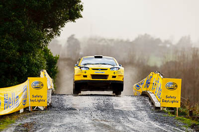 4;16-July-2011;4;APRC;Alister-McRae;Asia-Pacific-Rally-Championship;Bill-Hayes;International-Rally-Of-Whangarei;NZ;New-Zealand;Northland;Proton-Motorsports;Proton-Satria-Neo-S2000;Rally;Whangarei;auto;garage;motorsport;racing;special-stage;super-telephoto