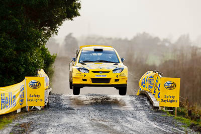 4;16-July-2011;4;APRC;Alister-McRae;Asia-Pacific-Rally-Championship;Bill-Hayes;International-Rally-Of-Whangarei;NZ;New-Zealand;Northland;Proton-Motorsports;Proton-Satria-Neo-S2000;Rally;Whangarei;auto;garage;motorsport;racing;special-stage;super-telephoto