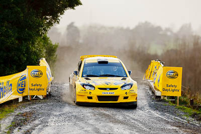 4;16-July-2011;4;APRC;Alister-McRae;Asia-Pacific-Rally-Championship;Bill-Hayes;International-Rally-Of-Whangarei;NZ;New-Zealand;Northland;Proton-Motorsports;Proton-Satria-Neo-S2000;Rally;Whangarei;auto;garage;motorsport;racing;special-stage;super-telephoto