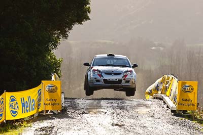 18;16-July-2011;APRC;Asia-Pacific-Rally-Championship;International-Rally-Of-Whangarei;Karamjit-Singh;NZ;New-Zealand;Northland;Proton-Cusco-Rally-Team;Proton-Satria-Neo;Rally;Vivek-Ponnusamy;Whangarei;auto;garage;motorsport;racing;special-stage;super-telephoto