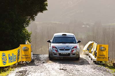 18;16-July-2011;APRC;Asia-Pacific-Rally-Championship;International-Rally-Of-Whangarei;Karamjit-Singh;NZ;New-Zealand;Northland;Proton-Cusco-Rally-Team;Proton-Satria-Neo;Rally;Vivek-Ponnusamy;Whangarei;auto;garage;motorsport;racing;special-stage;super-telephoto