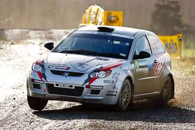 18;16-July-2011;APRC;Asia-Pacific-Rally-Championship;International-Rally-Of-Whangarei;Karamjit-Singh;NZ;New-Zealand;Northland;Proton-Cusco-Rally-Team;Proton-Satria-Neo;Rally;Vivek-Ponnusamy;Whangarei;auto;garage;motorsport;racing;special-stage;super-telephoto