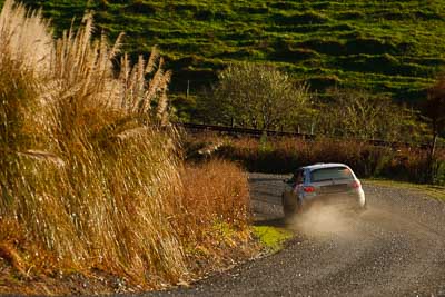 18;16-July-2011;APRC;Asia-Pacific-Rally-Championship;International-Rally-Of-Whangarei;Karamjit-Singh;NZ;New-Zealand;Northland;Proton-Cusco-Rally-Team;Proton-Satria-Neo;Rally;Vivek-Ponnusamy;Whangarei;auto;garage;motorsport;racing;special-stage;super-telephoto