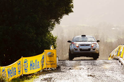 21;16-July-2011;21;APRC;Akira-Bamba;Asia-Pacific-Rally-Championship;International-Rally-Of-Whangarei;NZ;New-Zealand;Northland;Proton-Cusco-Rally-Team;Proton-Satria-Neo;Rally;Takahiro-Yasui;Whangarei;auto;garage;motorsport;racing;special-stage;super-telephoto