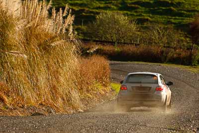 21;16-July-2011;21;APRC;Akira-Bamba;Asia-Pacific-Rally-Championship;International-Rally-Of-Whangarei;NZ;New-Zealand;Northland;Proton-Cusco-Rally-Team;Proton-Satria-Neo;Rally;Takahiro-Yasui;Whangarei;auto;garage;motorsport;racing;special-stage;super-telephoto