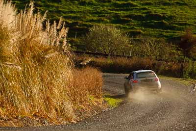 21;16-July-2011;21;APRC;Akira-Bamba;Asia-Pacific-Rally-Championship;International-Rally-Of-Whangarei;NZ;New-Zealand;Northland;Proton-Cusco-Rally-Team;Proton-Satria-Neo;Rally;Takahiro-Yasui;Whangarei;auto;garage;motorsport;racing;special-stage;super-telephoto