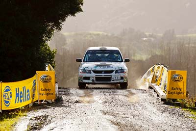 29;16-July-2011;29;APRC;Asia-Pacific-Rally-Championship;Cherish-Rally-Team;International-Rally-Of-Whangarei;Mitsubishi-Lancer-Evolution-IX;NZ;New-Zealand;Northland;Rally;Seiichiro-Taguchi;Shigeru-Ikeda;Whangarei;auto;garage;motorsport;racing;special-stage;super-telephoto