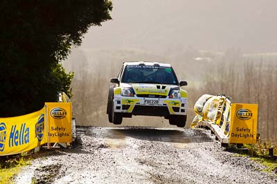 30;16-July-2011;30;APRC;Asia-Pacific-Rally-Championship;Bruce-McKenzie;Dave-Strong;Ford-Fiesta-S2000;International-Rally-Of-Whangarei;NZ;New-Zealand;Northland;Rally;Whangarei;auto;garage;motorsport;racing;special-stage;super-telephoto