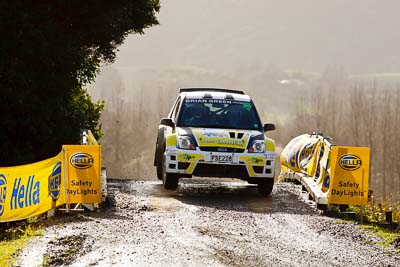 30;16-July-2011;30;APRC;Asia-Pacific-Rally-Championship;Bruce-McKenzie;Dave-Strong;Ford-Fiesta-S2000;International-Rally-Of-Whangarei;NZ;New-Zealand;Northland;Rally;Whangarei;auto;garage;motorsport;racing;special-stage;super-telephoto