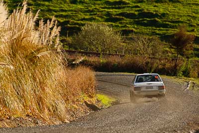 75;16-July-2011;75;APRC;Asia-Pacific-Rally-Championship;Chris-Davison;International-Rally-Of-Whangarei;Lee-Stringer;Mitsubishi-Lancer;NZ;New-Zealand;Northland;Rally;Whangarei;auto;garage;motorsport;racing;special-stage;super-telephoto