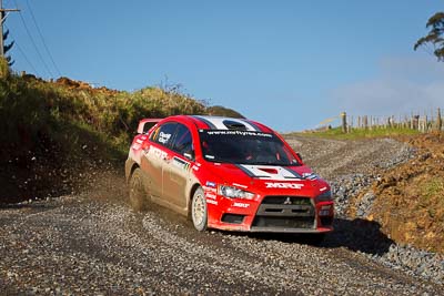 1;1;16-July-2011;APRC;Asia-Pacific-Rally-Championship;International-Rally-Of-Whangarei;Katsu-Taguchi;Mark-Stacey;Mitsubishi-Lancer-Evolution-X;NZ;New-Zealand;Northland;Rally;Team-MRF;Whangarei;auto;garage;motorsport;racing;special-stage;telephoto