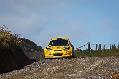 2;16-July-2011;2;APRC;Asia-Pacific-Rally-Championship;Chris-Atkinson;International-Rally-Of-Whangarei;NZ;New-Zealand;Northland;Proton-Motorsports;Proton-Satria-Neo-S2000;Rally;Stephane-Prevot;Whangarei;auto;garage;motorsport;racing;special-stage;telephoto