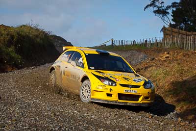 2;16-July-2011;2;APRC;Asia-Pacific-Rally-Championship;Chris-Atkinson;International-Rally-Of-Whangarei;NZ;New-Zealand;Northland;Proton-Motorsports;Proton-Satria-Neo-S2000;Rally;Stephane-Prevot;Whangarei;auto;garage;motorsport;racing;special-stage;telephoto