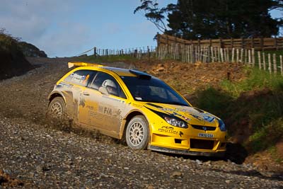 2;16-July-2011;2;APRC;Asia-Pacific-Rally-Championship;Chris-Atkinson;International-Rally-Of-Whangarei;NZ;New-Zealand;Northland;Proton-Motorsports;Proton-Satria-Neo-S2000;Rally;Stephane-Prevot;Whangarei;auto;garage;motorsport;racing;special-stage;telephoto