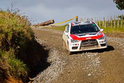 16;16;16-July-2011;APRC;Asia-Pacific-Rally-Championship;International-Rally-Of-Whangarei;NZ;New-Zealand;Northland;Rally;Whangarei;auto;garage;motorsport;racing;special-stage;telephoto