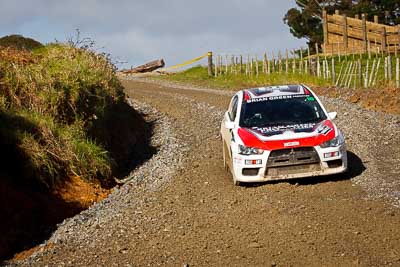 16;16;16-July-2011;APRC;Asia-Pacific-Rally-Championship;International-Rally-Of-Whangarei;NZ;New-Zealand;Northland;Rally;Whangarei;auto;garage;motorsport;racing;special-stage;telephoto