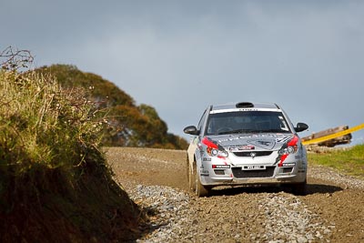 18;16-July-2011;APRC;Asia-Pacific-Rally-Championship;International-Rally-Of-Whangarei;Karamjit-Singh;NZ;New-Zealand;Northland;Proton-Cusco-Rally-Team;Proton-Satria-Neo;Rally;Vivek-Ponnusamy;Whangarei;auto;garage;motorsport;racing;special-stage;super-telephoto