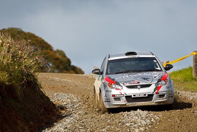 18;16-July-2011;APRC;Asia-Pacific-Rally-Championship;International-Rally-Of-Whangarei;Karamjit-Singh;NZ;New-Zealand;Northland;Proton-Cusco-Rally-Team;Proton-Satria-Neo;Rally;Vivek-Ponnusamy;Whangarei;auto;garage;motorsport;racing;special-stage;super-telephoto